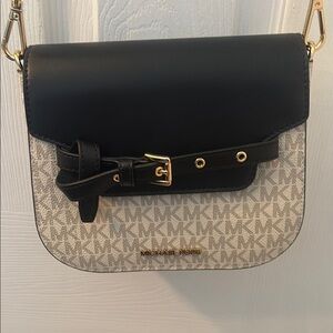 Brand new. Michael Kors Black and Cream Crossbody Bag